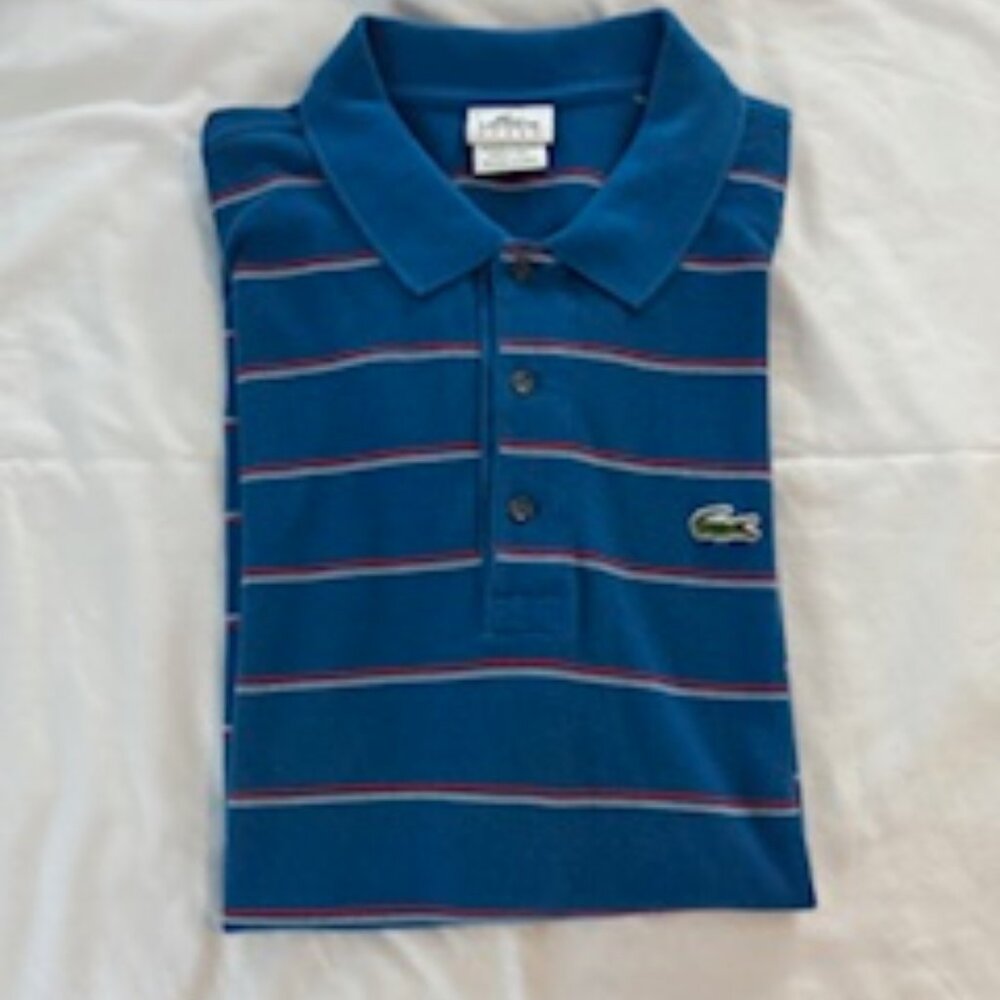Lacoste polo size 7 blue with red/white stripe